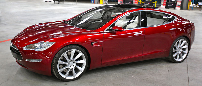Red colored Tesla, a modern electric car