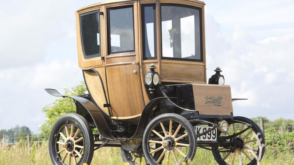 old-fashioned / vintage with wood furnished electric car 