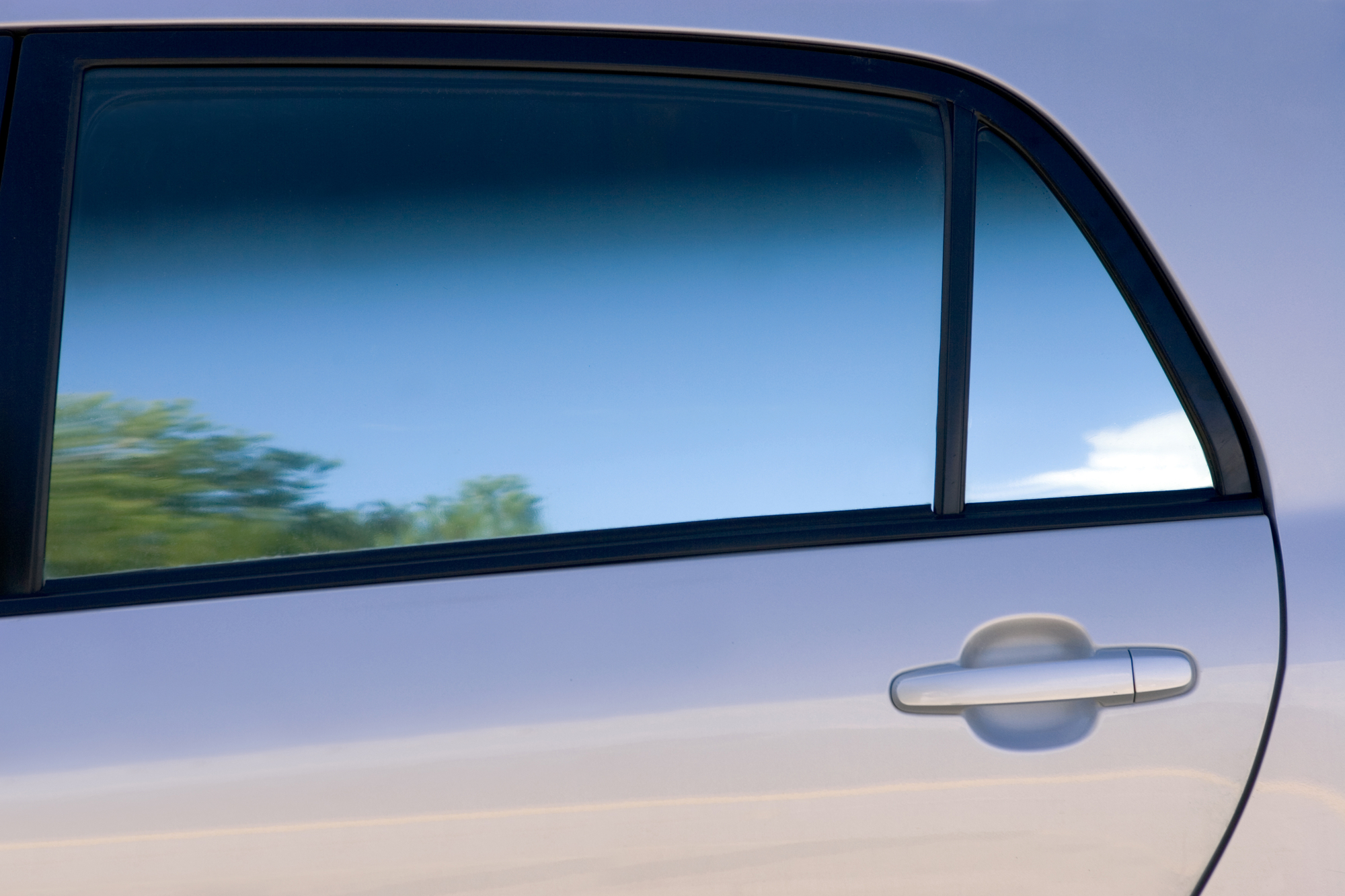 Tinted car side window with shade