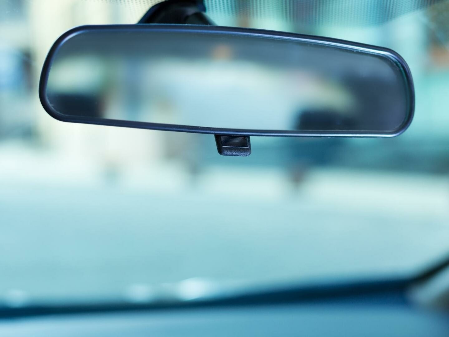 Close up view on clean windshield and rear view mirror