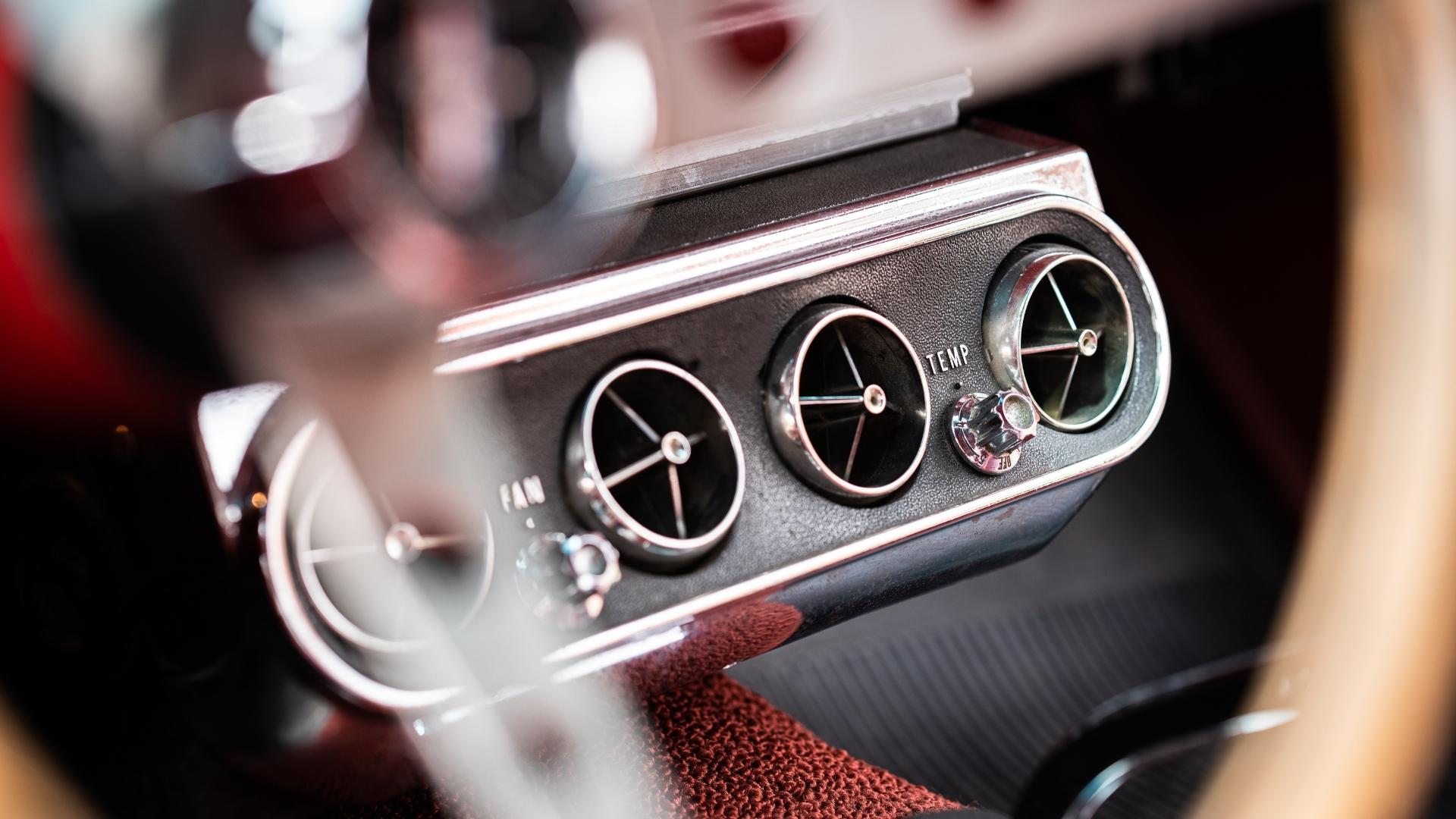 Temperature controls and air channels on a vintage car