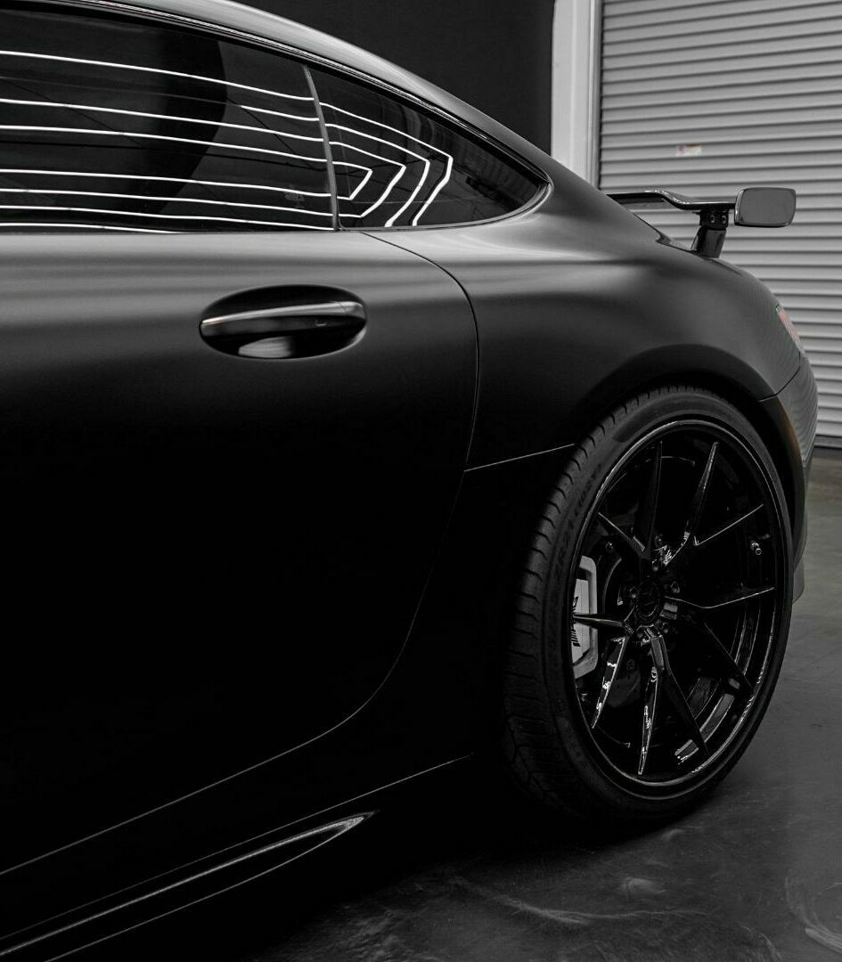 Mercedes wrapped in black matte film, sporty car